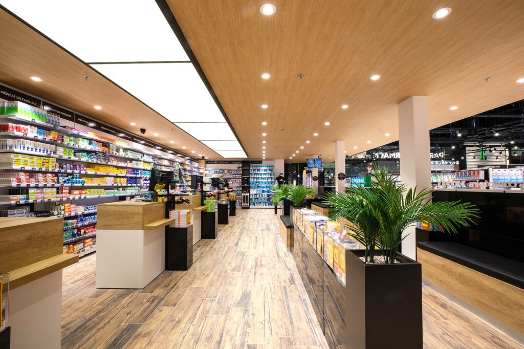 Ligne de caisses ordonnances - Gestion de flux par plexibox et jardinières